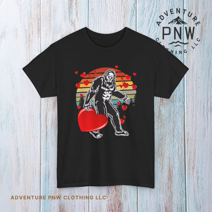 Bigfoot With Heart Unisex Tee, Sasquatch Valentine Gift Shirt, Valentines Day Apparel, Cryptid Lover T-Shirt, Mythical Creature Top